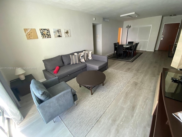 living area featuring light wood-style floors