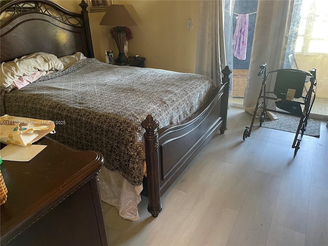 bedroom featuring light hardwood / wood-style floors