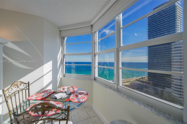 sunroom with a water view