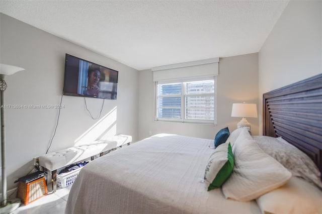 bedroom featuring a textured ceiling