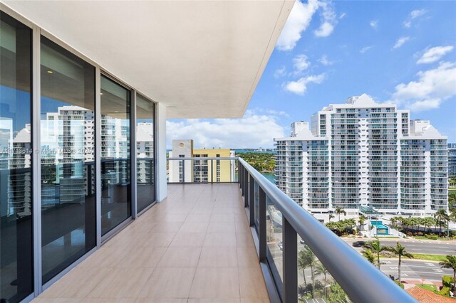 drone / aerial view featuring a view of the beach and a water view