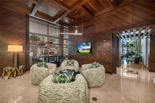 tiled living room featuring wood ceiling, a high ceiling, coffered ceiling, beamed ceiling, and wood walls