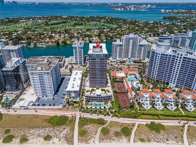 birds eye view of property with a water view