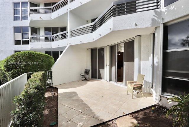 view of patio / terrace with a balcony