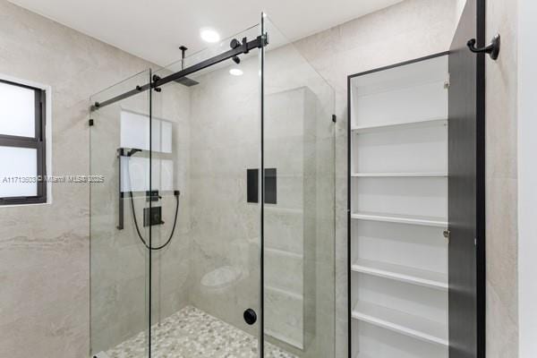bathroom featuring a stall shower