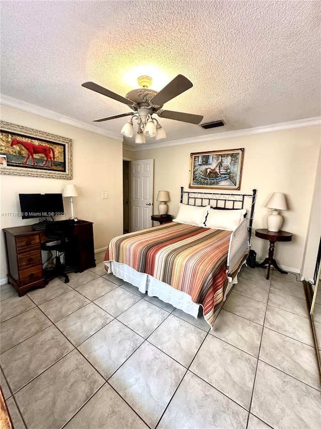 bedroom with a textured ceiling, ceiling fan, light tile patterned floors, and crown molding