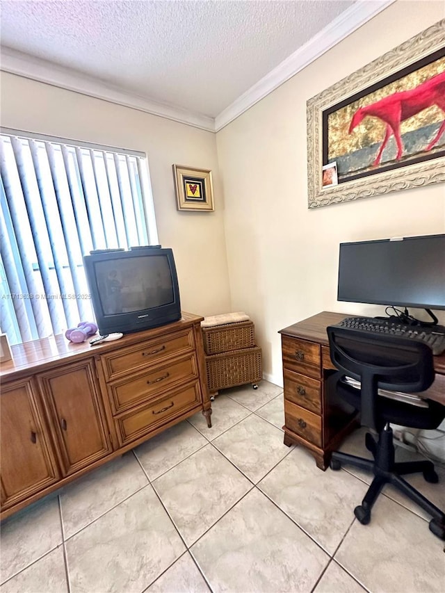 home office with light tile patterned floors, a textured ceiling, and ornamental molding