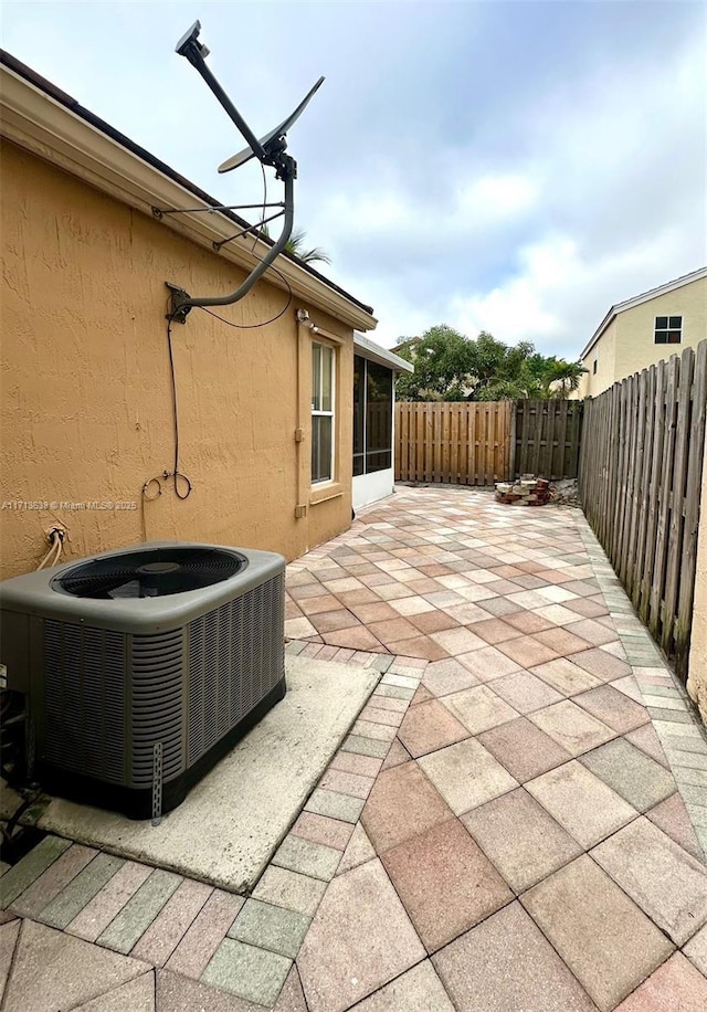 view of patio featuring central air condition unit