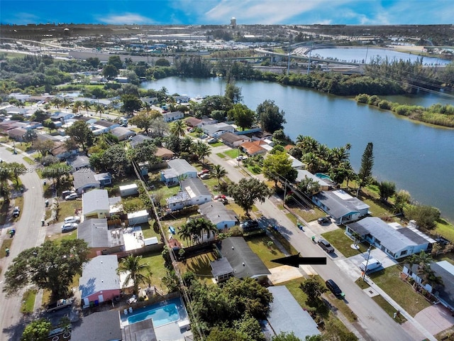 bird's eye view with a water view