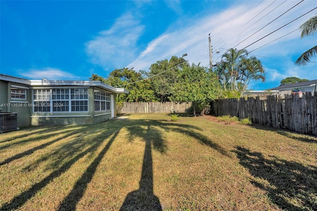 view of yard featuring central AC