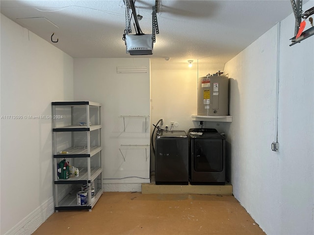 basement featuring washer and dryer and water heater