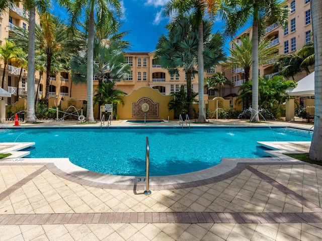 view of pool featuring pool water feature