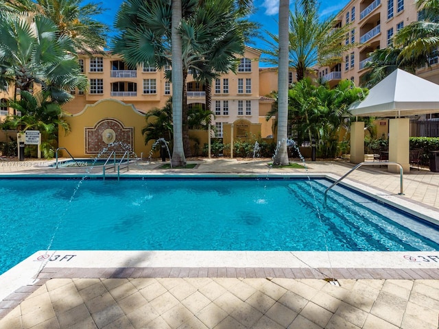 view of pool featuring a patio