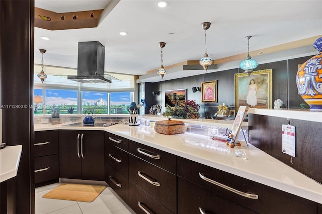 kitchen featuring light tile patterned flooring, decorative light fixtures, island exhaust hood, dark brown cabinetry, and black electric cooktop