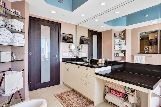 bathroom featuring vanity and tile patterned flooring