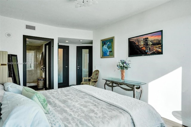 bedroom featuring hardwood / wood-style floors