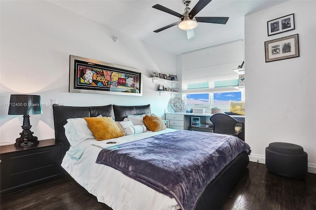 bedroom with dark wood-type flooring and ceiling fan