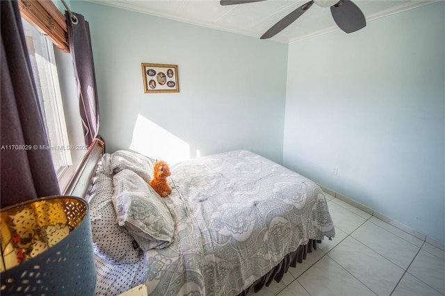 bedroom with tile patterned flooring, crown molding, multiple windows, and a ceiling fan