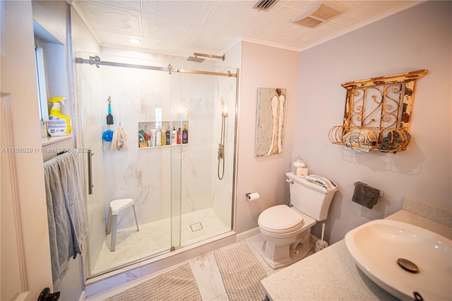 bathroom featuring visible vents, a marble finish shower, and a sink