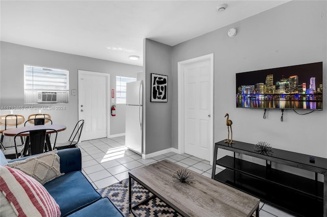 living room with light tile patterned flooring and cooling unit