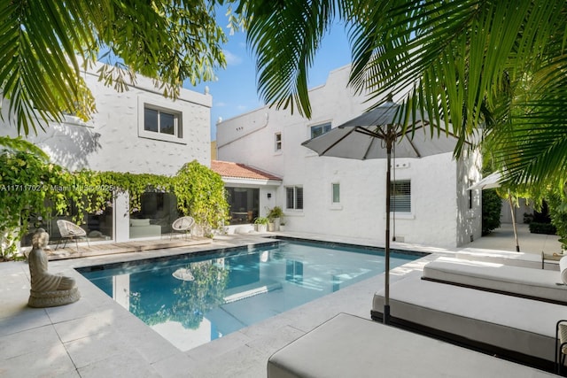 view of pool with a patio area