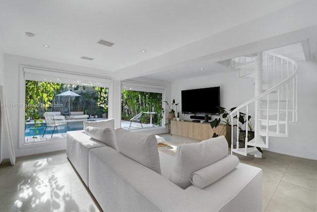 living room featuring light tile patterned floors