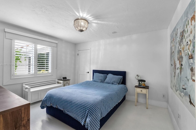 bedroom featuring a textured ceiling