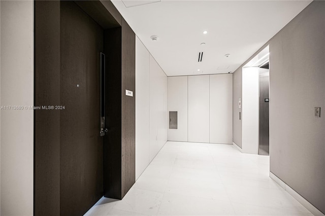 corridor featuring elevator