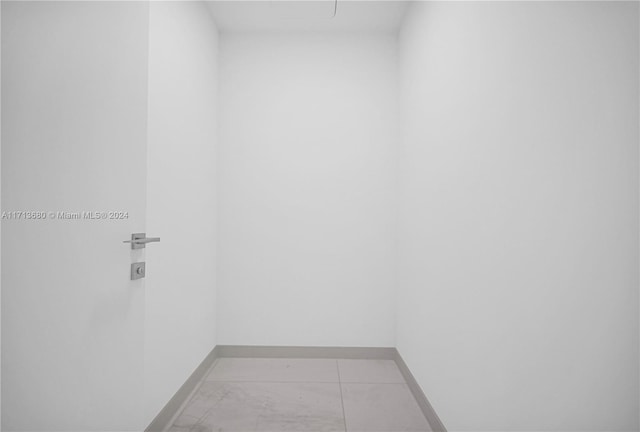 walk in closet featuring light tile patterned floors