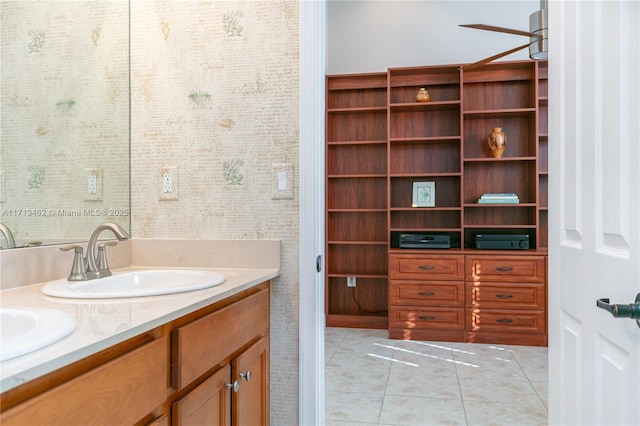 bathroom with tile patterned floors and vanity