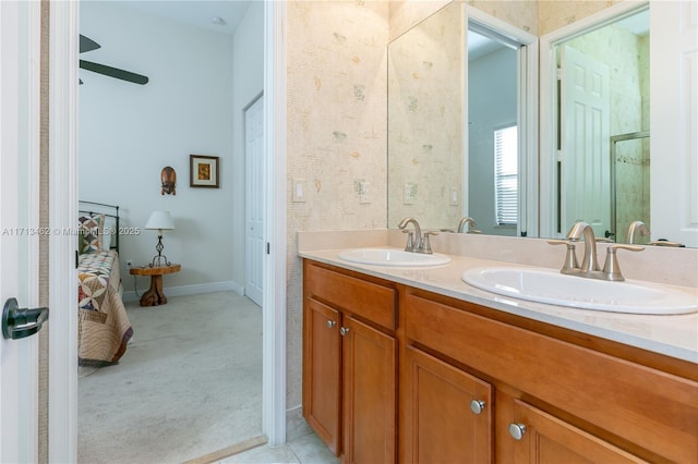 bathroom with vanity and ceiling fan