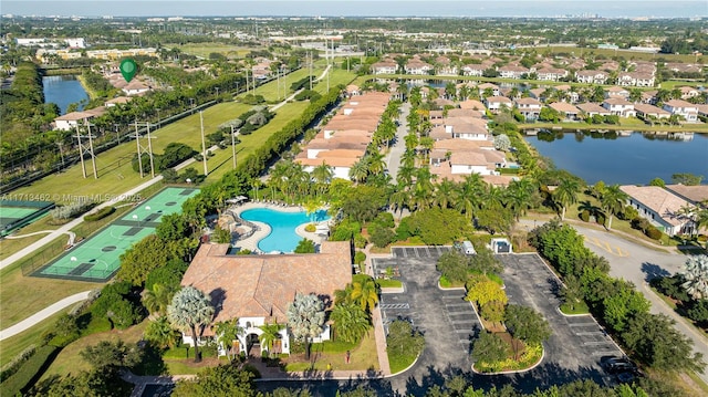 birds eye view of property featuring a water view