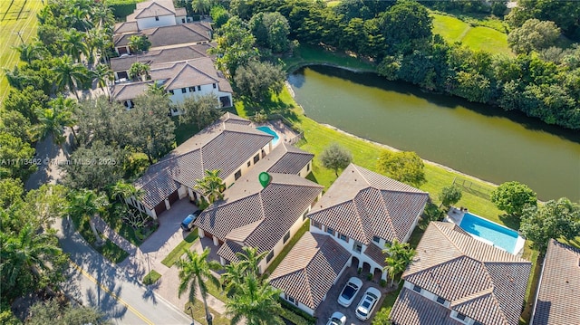 bird's eye view with a water view