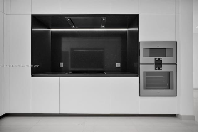 interior details with stovetop and stainless steel double oven