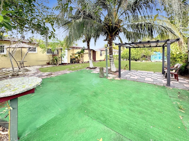 view of yard featuring a pergola and a patio area