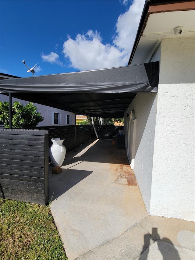 view of parking with a carport