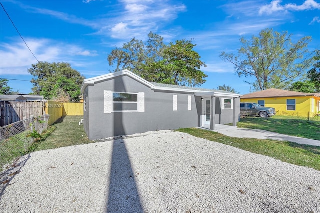 view of front of home with a front yard