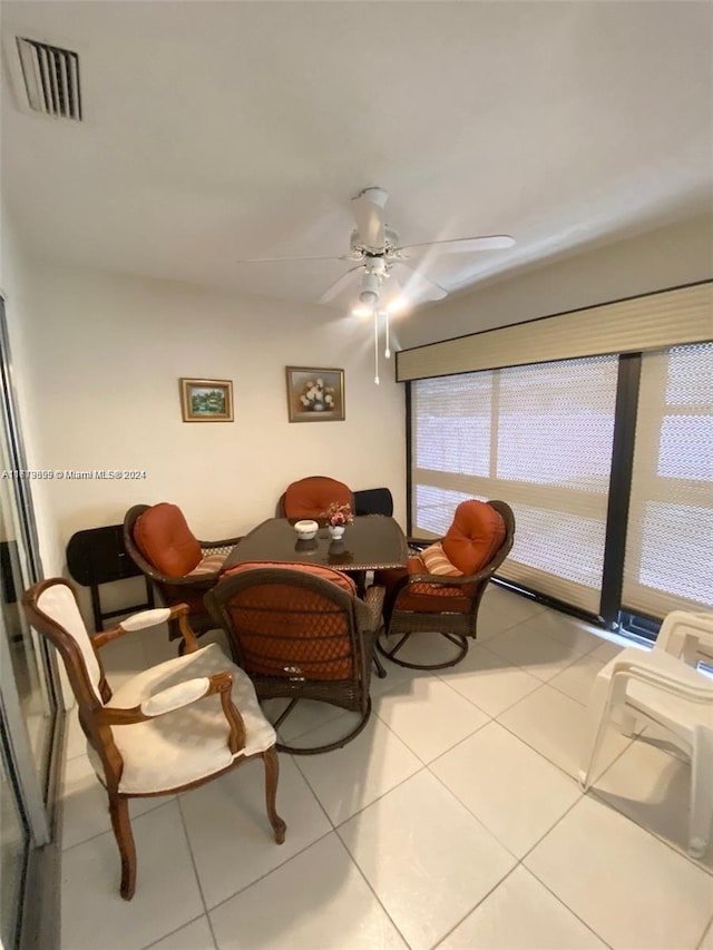 interior space featuring ceiling fan and light tile patterned flooring