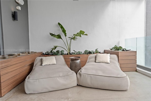 living area featuring concrete floors