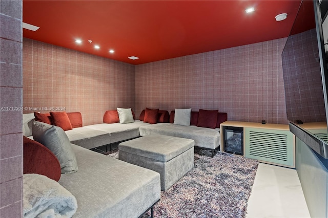 home theater featuring concrete flooring