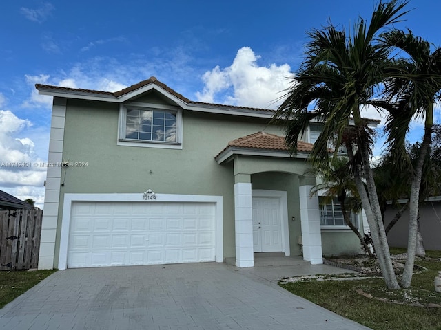 view of front of property featuring a garage