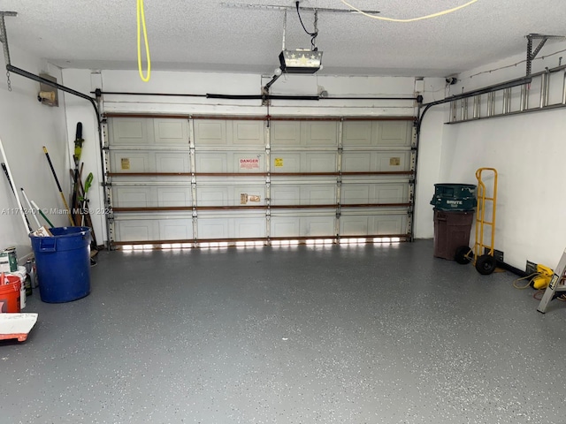 garage featuring a garage door opener