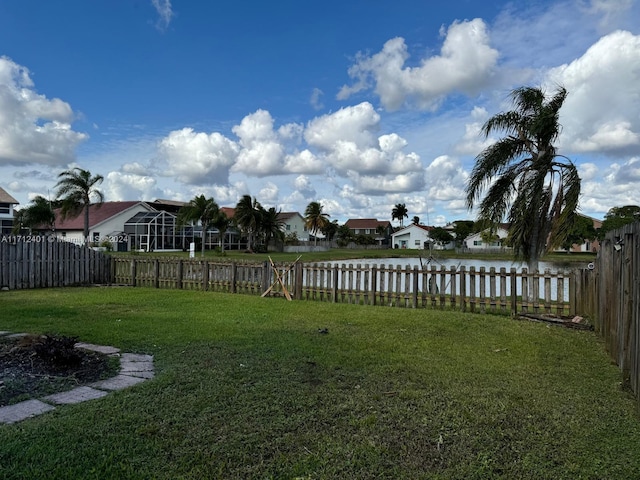 view of yard with a water view