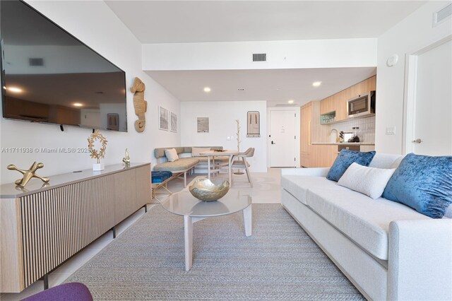 601 NE 1st Ave Unit 2409, Miami, FL 33132 - living room featuring recessed lighting and light tile patterned flooring