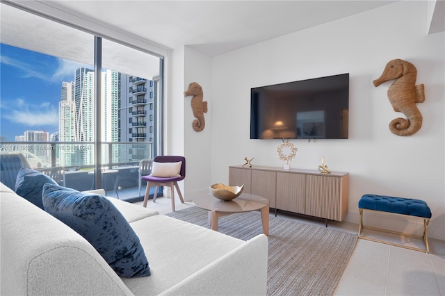 tiled living room featuring expansive windows