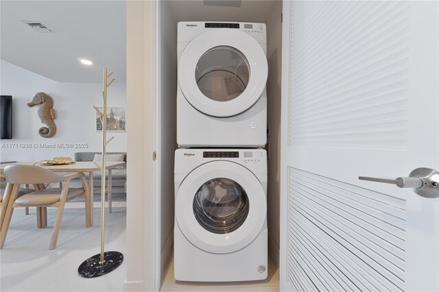 601 NE 1st Ave Unit 2409, Miami, FL 33132 - laundry room featuring stacked washing machine and dryer