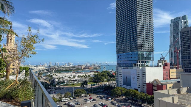 property's view of city with a water view