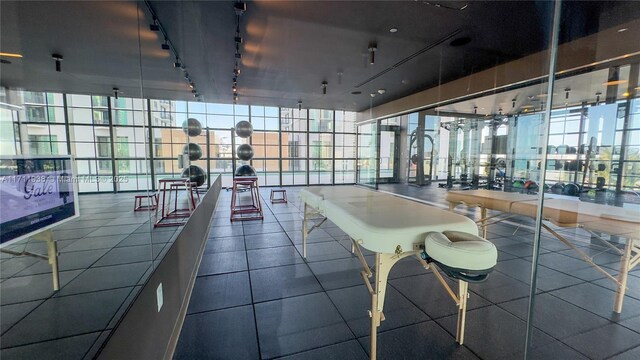 601 NE 1st Ave Unit 2409, Miami, FL 33132 - exercise room featuring track lighting, plenty of natural light, and floor to ceiling windows