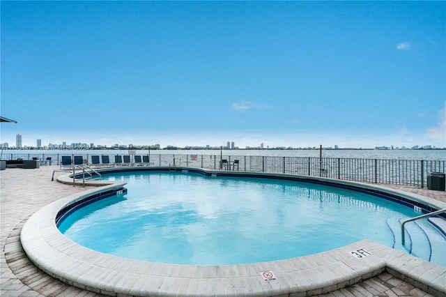 view of pool featuring a patio