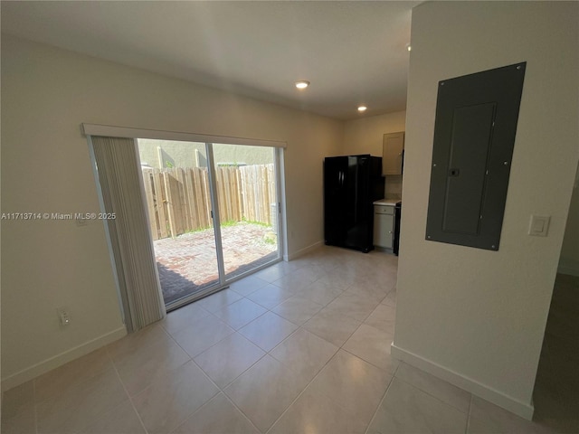 495 NE 5th Ln, Florida City, FL 33034 - unfurnished room featuring electric panel, baseboards, light tile patterned floors, and recessed lighting